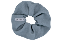 Load image into Gallery viewer, Hi! I'm MARILOU, a big light blue corduroy scrunchie.  It draws attention without stealing the spotlight, and ties itself up in many ways.