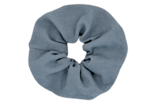 Load image into Gallery viewer, Hi! I'm MARILOU, a big light blue corduroy scrunchie.  It draws attention without stealing the spotlight, and ties itself up in many ways.
