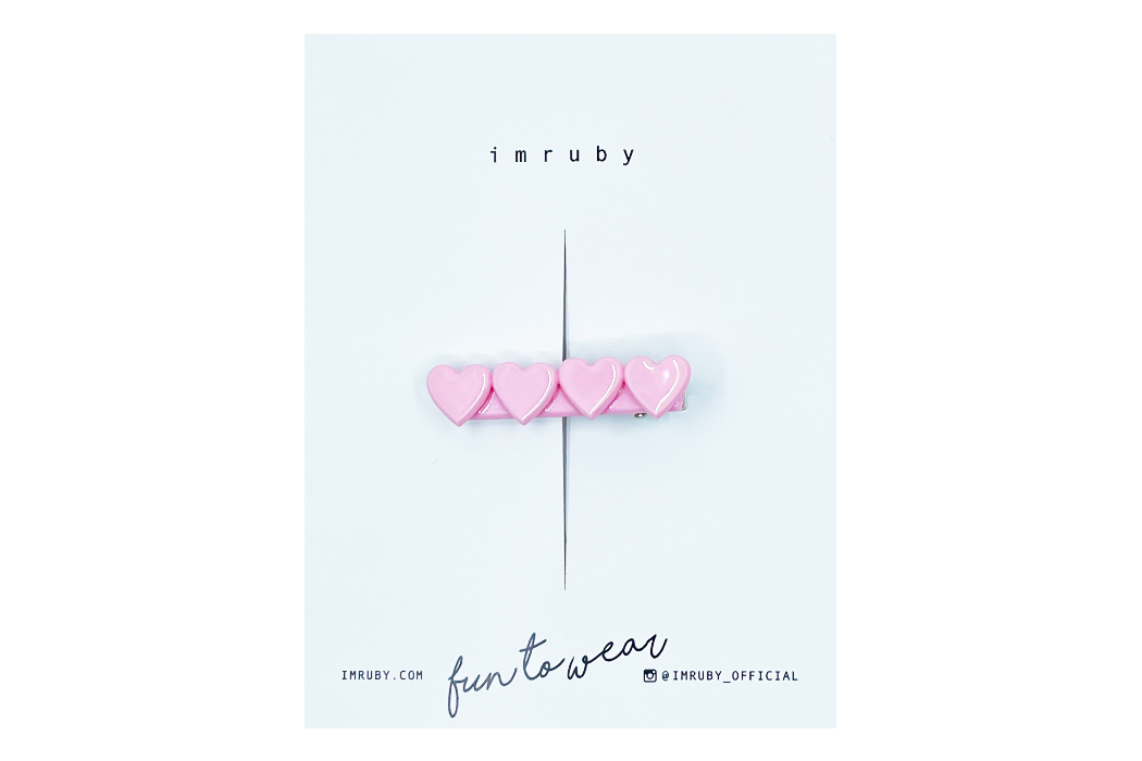 Hi! I'm ELLE, a soft pink heart clip.

Hold back bangs, clip back hair, or simply use for stylistic purposes by adding some flair to your hair. Mix-and-match, and layer these hair clips or wear on their own for a soft, seasonal look.
