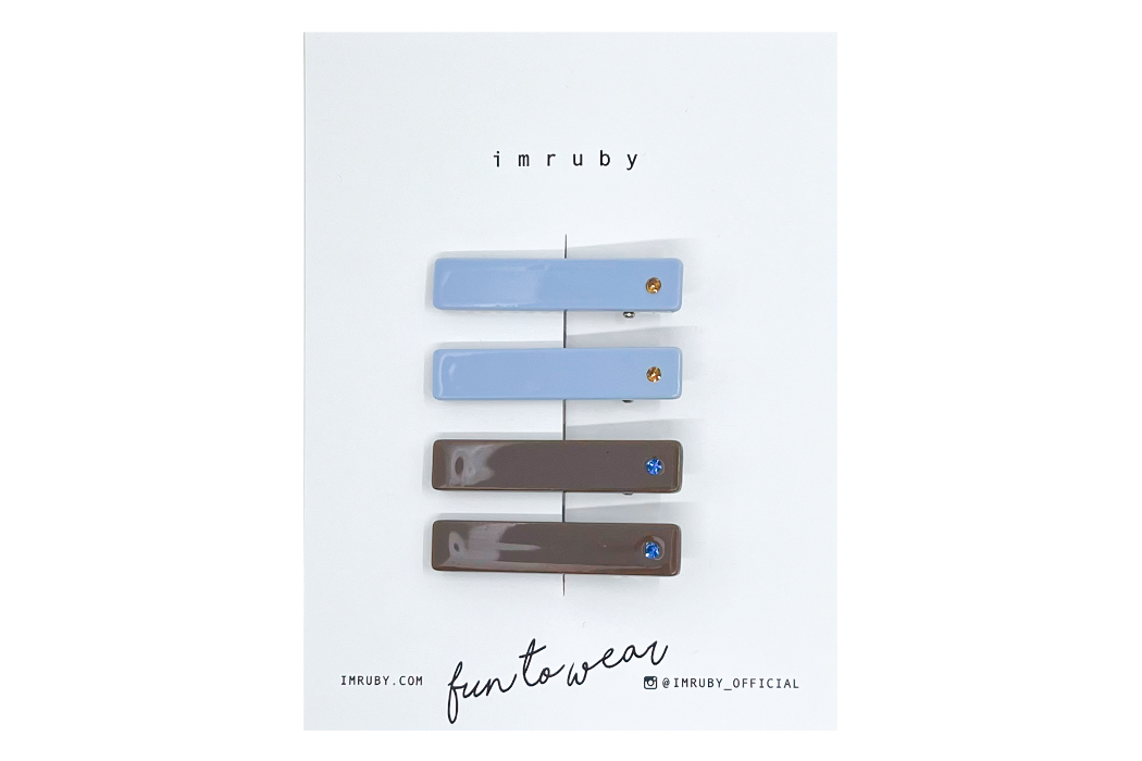 Hi! I'm the SHINE BRIGHT SET of 4 clips.

(2 x Emiley diamond bar, 2 x Polly diamond bar)

Hold back bangs, clip back hair, or simply use for stylistic purposes by adding some flair to your hair. Mix-and-match, and layer these hair clips or wear on their own for a soft, seasonal look.