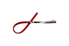 Load image into Gallery viewer, Hi! I&#39;m SUKI, a bold red barrette with a twist

Sleek, strong, and ready to snap into place. My gently curved shape adds a soft, sculptural touch to your look — whether you&#39;re going for effortless chic or pulled-back polish. Lightweight, glossy, and made to stay put. Just clip and go.