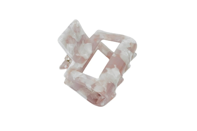 Hi! I'm YVONNE, a soft pink hair claw.  This hair claw lets you pull your hair up or back with ease and style! The square-shaped cutout design is the right fit for any occassion. 