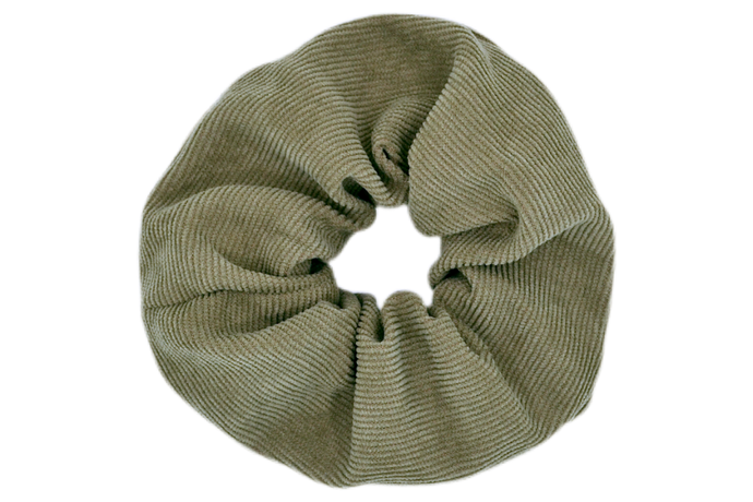 Hi! I'm DONNA, a big green corduroy scrunchie.  It draws attention without stealing the spotlight, and ties itself up in many ways.