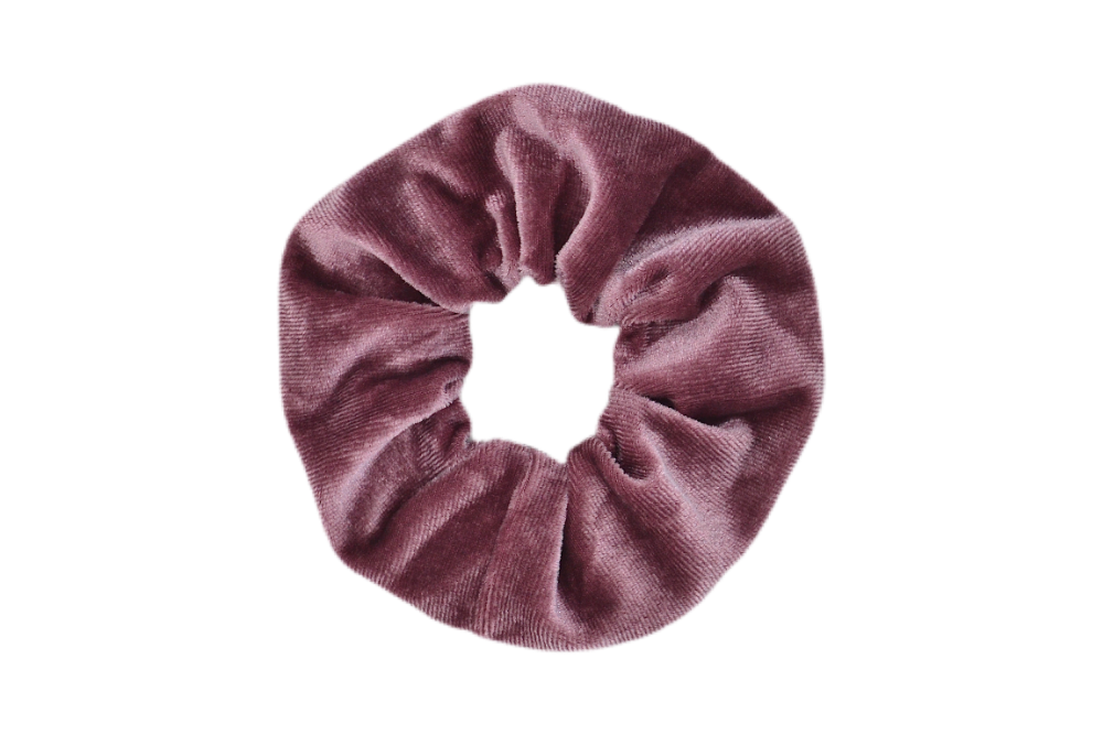 Hi! I'm FREJA, a pink velvet scrunchie.  Throwback your style to the 90's with this hair scrunchie! Perfect for wearing in your hair or styling it around your wrist, this pretty scrunchie is the ultimate two-in-one accessory.