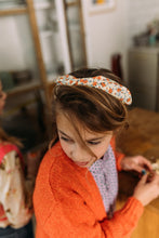 Afbeelding in Gallery-weergave laden, Hi! I&#39;m JAGGER, an orange flower headband.  This headband has an aluminium wire insert for a comfortable &amp; cute fit. Twist it around your girls head and she&#39;ll rock this pretty headband all day long!  This headband is the perfect fit for girls till 12 years.