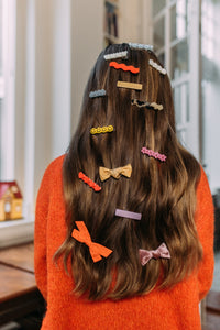 Hi! I'm OLGA, a sand colored bar clip.  Hold back bangs, clip back hair, or simply use for stylistic purposes by adding some flair to your hair. Mix-and-match, and layer these hair clips or wear on their own for a soft, seasonal look.