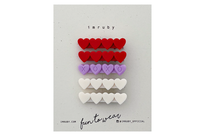 Hi! I'm a SET of 5 heart clips for the price of 4.  (2 x Suki, 1 x Aya, 2 x Bonnie)  Hold back bangs, clip back hair, or simply use for stylistic purposes by adding some flair to your hair. Mix-and-match, and layer these hair clips or wear on their own for a soft, seasonal look.