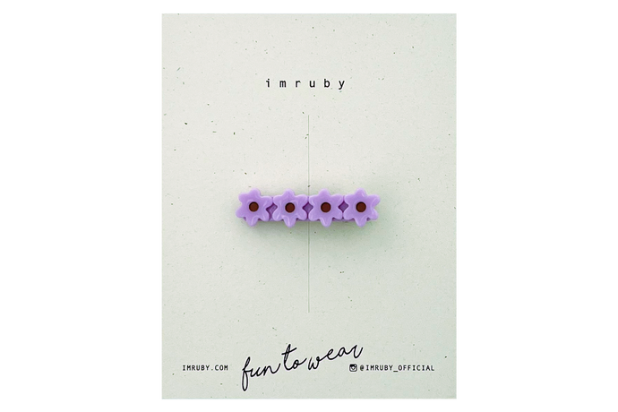 Hi! I'm FAYE, a purple flower clip.  Hold back bangs, clip back hair, or simply use for stylistic purposes by adding some flair to your hair. Mix-and-match, and layer these hair clips or wear on their own for a soft, seasonal look.