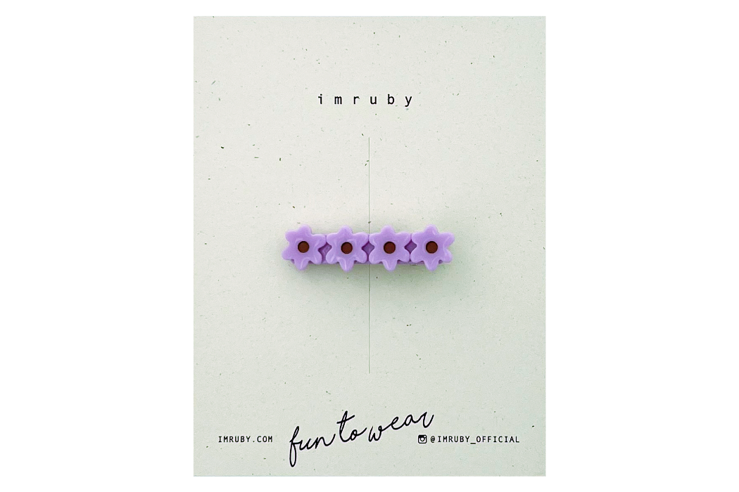 Hi! I'm FAYE, a purple flower clip.  Hold back bangs, clip back hair, or simply use for stylistic purposes by adding some flair to your hair. Mix-and-match, and layer these hair clips or wear on their own for a soft, seasonal look.