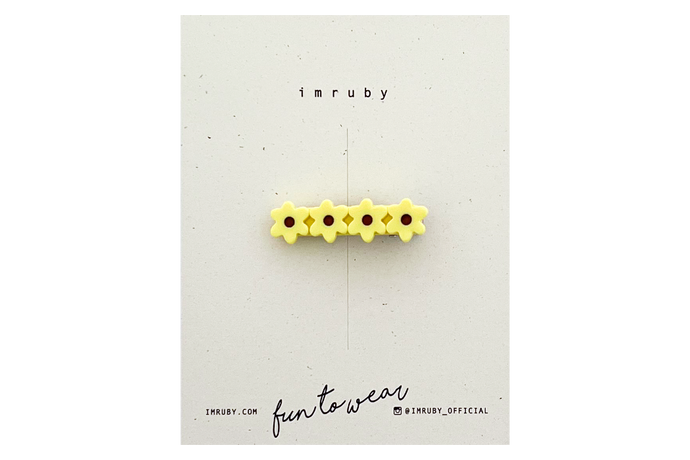 Hi! I'm DEMI, a bright yellow flower clip.  Hold back bangs, clip back hair, or simply use for stylistic purposes by adding some flair to your hair. Mix-and-match, and layer these hair clips or wear on their own for a soft, seasonal look.