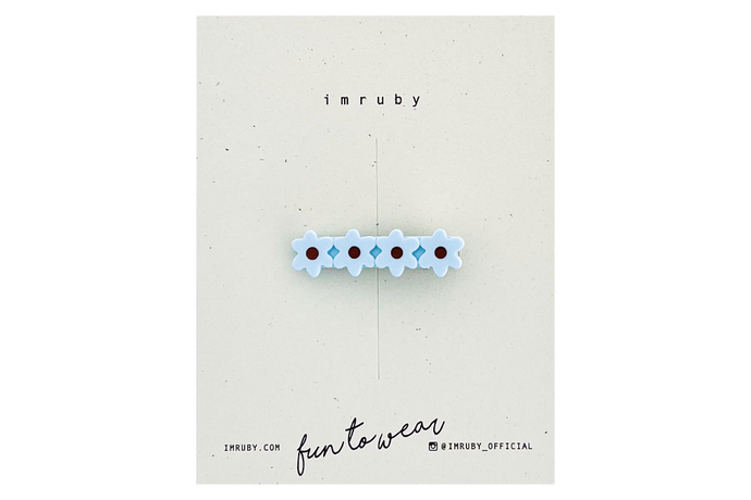 Hi! I'm ELSA, a light blue flower clip.  Hold back bangs, clip back hair, or simply use for stylistic purposes by adding some flair to your hair. Mix-and-match, and layer these hair clips or wear on their own for a soft, seasonal look.