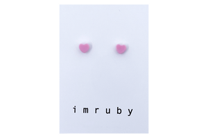 Hi! I'm ELLE, a soft pink heart set of 2 stud earrings.  If you are looking for a perfect everyday staple, stud earrings may be exactly what you need! They are very tiny and so cute! These earring sets are perfect for numerous piercings or just to mix and match! 