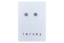 Load image into Gallery viewer, Hi! I&#39;m BIBI, a silver glitter smiley set of 2 stud earrings.  If you are looking for a perfect everyday staple, stud earrings may be exactly what you need! They are very tiny and so cute! These earring sets are perfect for numerous piercings or just to mix and match! 