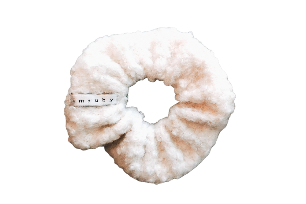 Hi! I'm ANEMONE, a teddy bouclé little scrunchie.  Throwback your style to the 90's with this hair scrunchie! Perfect for wearing in your hair or styling it around your wrist, this pretty scrunchie is the ultimate two-in-one accessory.