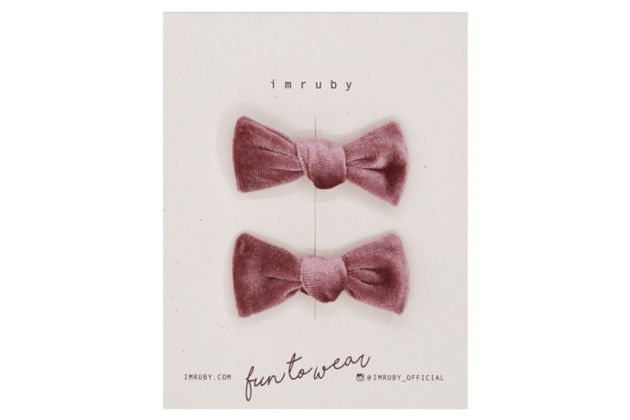 Hi! I'm MILLE, a set of pink velvet candy bows.  Clip those little hairs back in style with this set of velvet candy bows. It features alligator clip backings for easy placement in any fun hairstyle. 