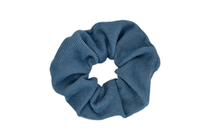Hi! I'm JACKIE, an darker blue corduroy scrunchie.  Throwback your style to the 90's with this hair scrunchie! Perfect for wearing in your hair or styling it around your wrist, this pretty scrunchie is the ultimate two-in-one accessory.