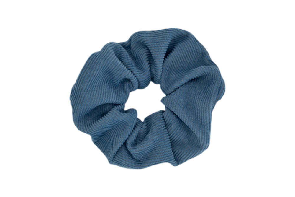 Hi! I'm JACKIE, an darker blue corduroy scrunchie.  Throwback your style to the 90's with this hair scrunchie! Perfect for wearing in your hair or styling it around your wrist, this pretty scrunchie is the ultimate two-in-one accessory.