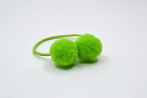 Hi! I'm LIZZY, a lime green elastic hair ties set.  Be on trend with this set of pom hair ties! This 2 pack of hair ties comes in lime green. 