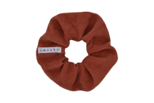 Load image into Gallery viewer, Hi! I&#39;m LIZ, an orange corduroy scrunchie.  Throwback your style to the 90&#39;s with this hair scrunchie! Perfect for wearing in your hair or styling it around your wrist, this pretty scrunchie is the ultimate two-in-one accessory.