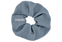 Load image into Gallery viewer, Hi! I&#39;m MARILOU, a big light blue corduroy scrunchie.  It draws attention without stealing the spotlight, and ties itself up in many ways.